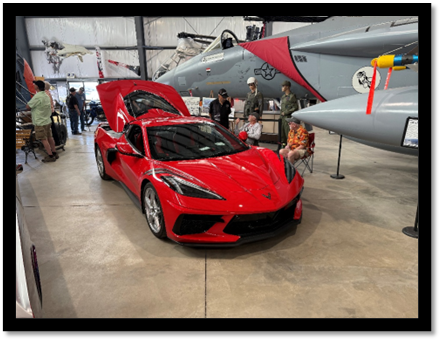 A red sports car with its hood open

AI-generated content may be incorrect.