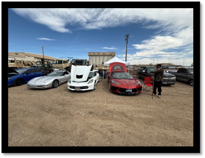 A group of cars parked in a parking lot

AI-generated content may be incorrect.