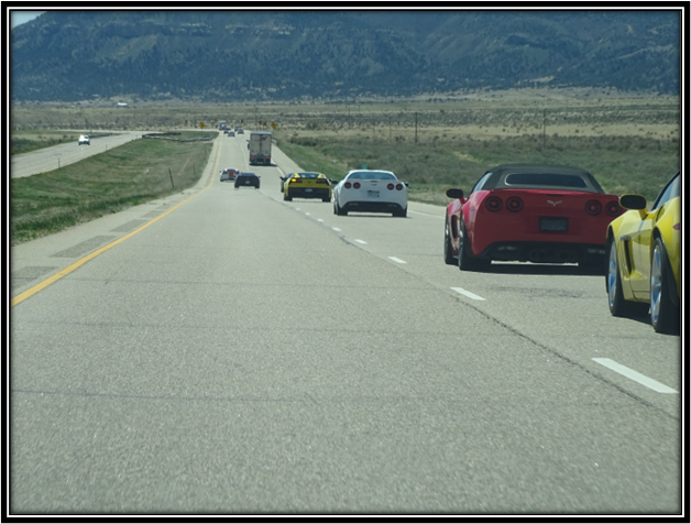 A group of cars on a road

Description automatically generated with low confidence