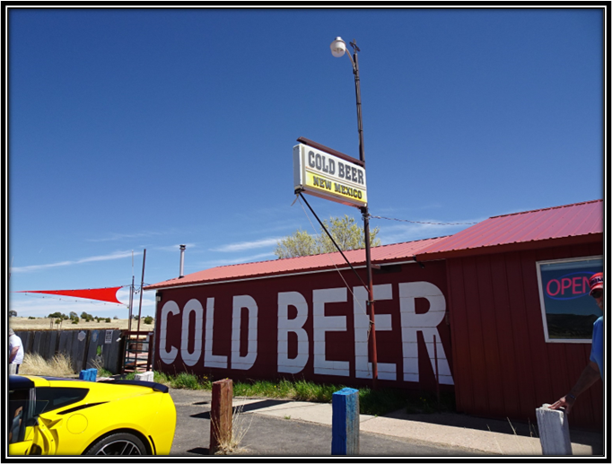 A yellow car parked in front of a building

Description automatically generated with medium confidence