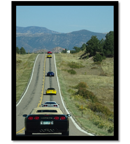 A car on the road

Description automatically generated