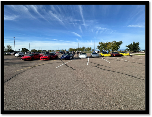 A group of cars parked in a parking lot

AI-generated content may be incorrect.