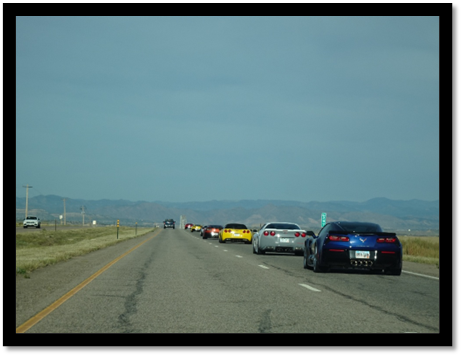 A group of cars on a road

AI-generated content may be incorrect.