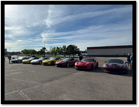 A group of cars parked in a parking lot

AI-generated content may be incorrect.