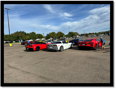 A group of cars parked in a parking lot

AI-generated content may be incorrect.