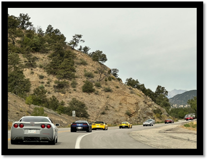 A group of cars on a road

AI-generated content may be incorrect.