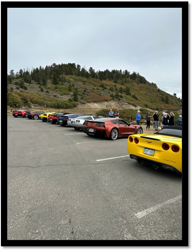 A group of cars parked in a parking lot

AI-generated content may be incorrect.