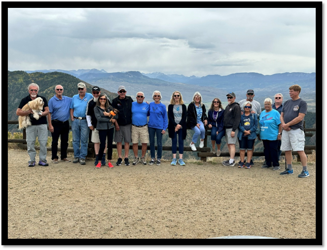 A group of people posing for a photo

AI-generated content may be incorrect.