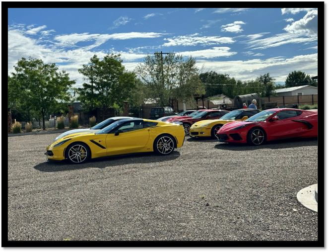 A group of cars parked in a parking lot

AI-generated content may be incorrect.