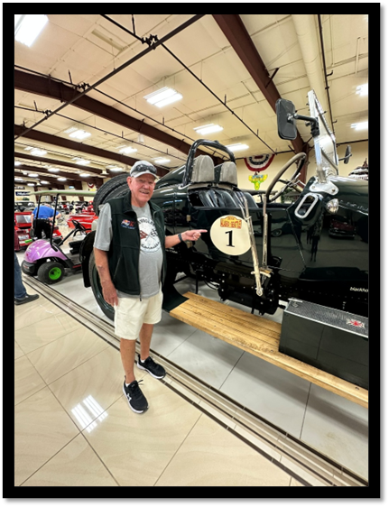 A person standing next to a car

AI-generated content may be incorrect.