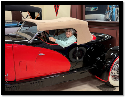 A person sitting in a car

AI-generated content may be incorrect.