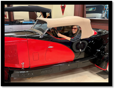 A person sitting in a car

AI-generated content may be incorrect.