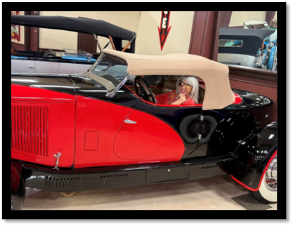 A person in a car

AI-generated content may be incorrect.