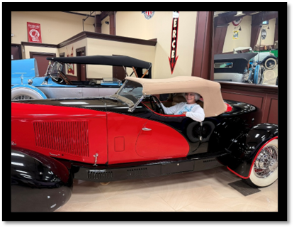 A person sitting in a car

AI-generated content may be incorrect.