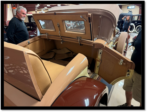 A person standing next to a car

AI-generated content may be incorrect.