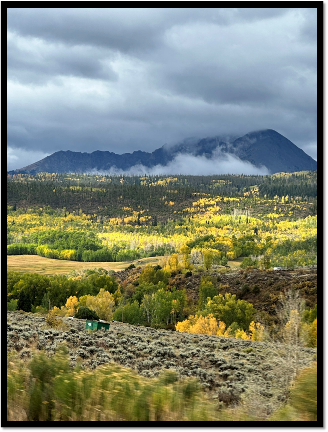 A landscape with mountains in the background

AI-generated content may be incorrect.