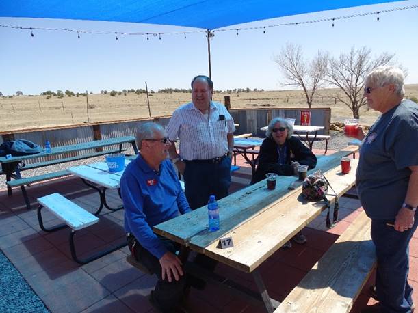 A group of men playing ping pong

Description automatically generated with low confidence