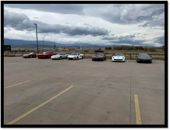 A group of cars parked in a parking lot

AI-generated content may be incorrect.