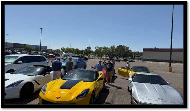 A group of people standing around a yellow sports car

AI-generated content may be incorrect.
