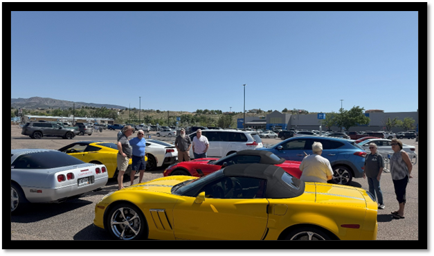 A group of people standing around a yellow sports car

AI-generated content may be incorrect.