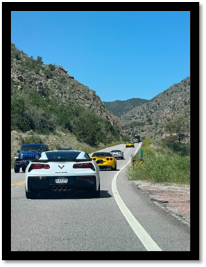 A group of cars on a road

AI-generated content may be incorrect.