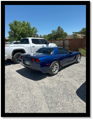A blue sports car parked in a lot

AI-generated content may be incorrect.