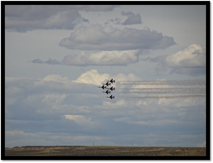 A group of jets flying in formation

AI-generated content may be incorrect.