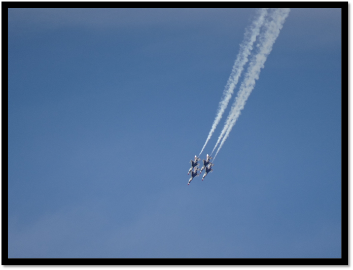 A group of jets flying in the sky

AI-generated content may be incorrect.