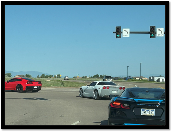 A group of cars on a road

AI-generated content may be incorrect.