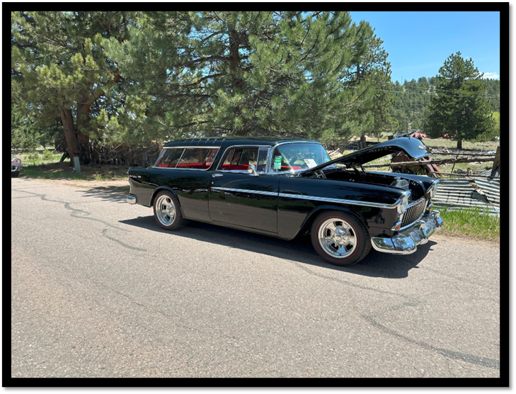 A black car with its hood open

AI-generated content may be incorrect.