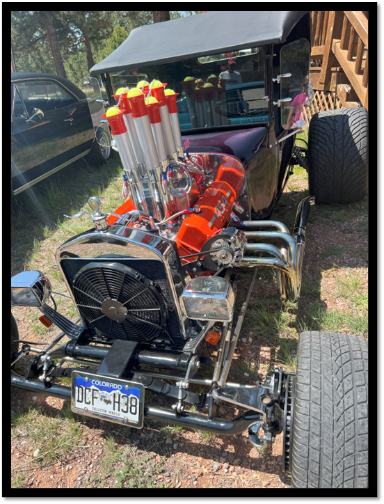 A car with a large engine

AI-generated content may be incorrect.