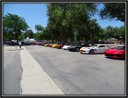 A group of cars parked on the side of a road

Description automatically generated with low confidence