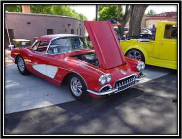 A red car with the hood open

Description automatically generated with medium confidence