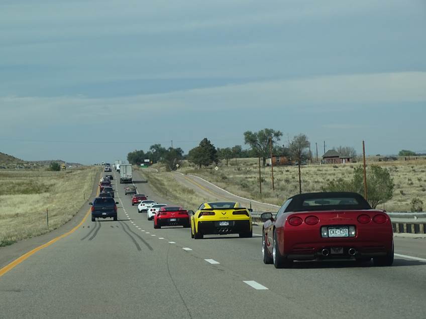 A group of cars on a highway

Description automatically generated