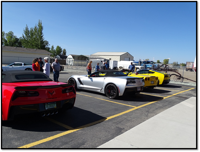 A group of cars parked in a parking lot

Description automatically generated with medium confidence