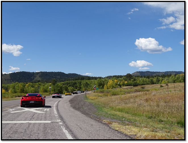 A group of cars on a road

Description automatically generated with medium confidence