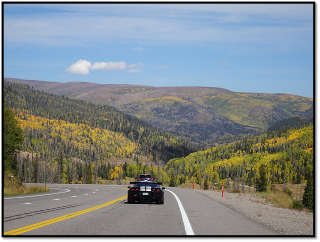 A car driving on a road

Description automatically generated with low confidence