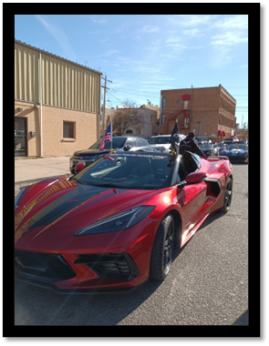 A red sports car parked on a street

AI-generated content may be incorrect.