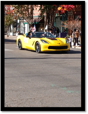 A yellow sports car on the street

AI-generated content may be incorrect.