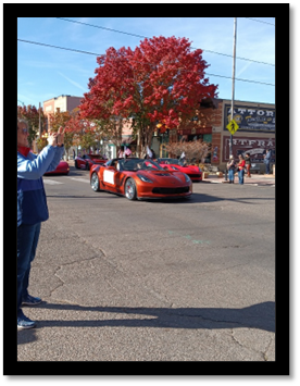 A red sports car on the street

AI-generated content may be incorrect.