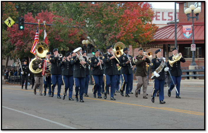 A group of people marching in a parade

Description automatically generated with low confidence