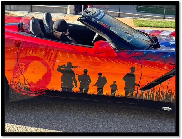 A car with a painted design

Description automatically generated