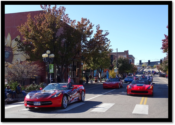 A group of cars on a street

Description automatically generated
