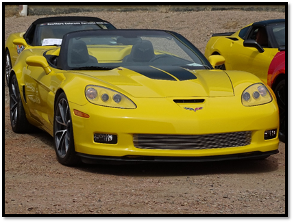 A yellow sports car

Description automatically generated with medium confidence